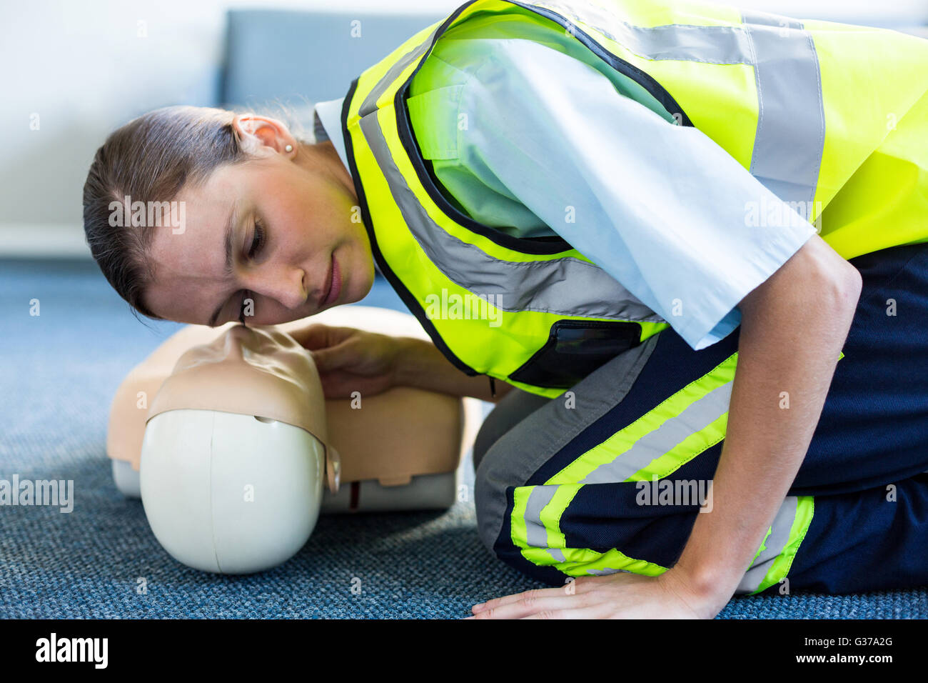 Female paramedic during cardiopulmonary resuscitation training Stock Photo