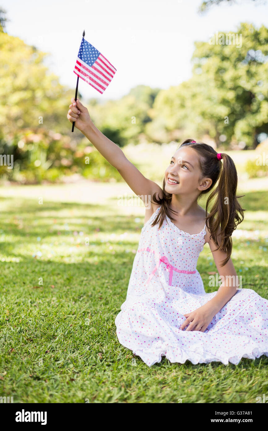 Girl holding an American flag Stock Photo - Alamy