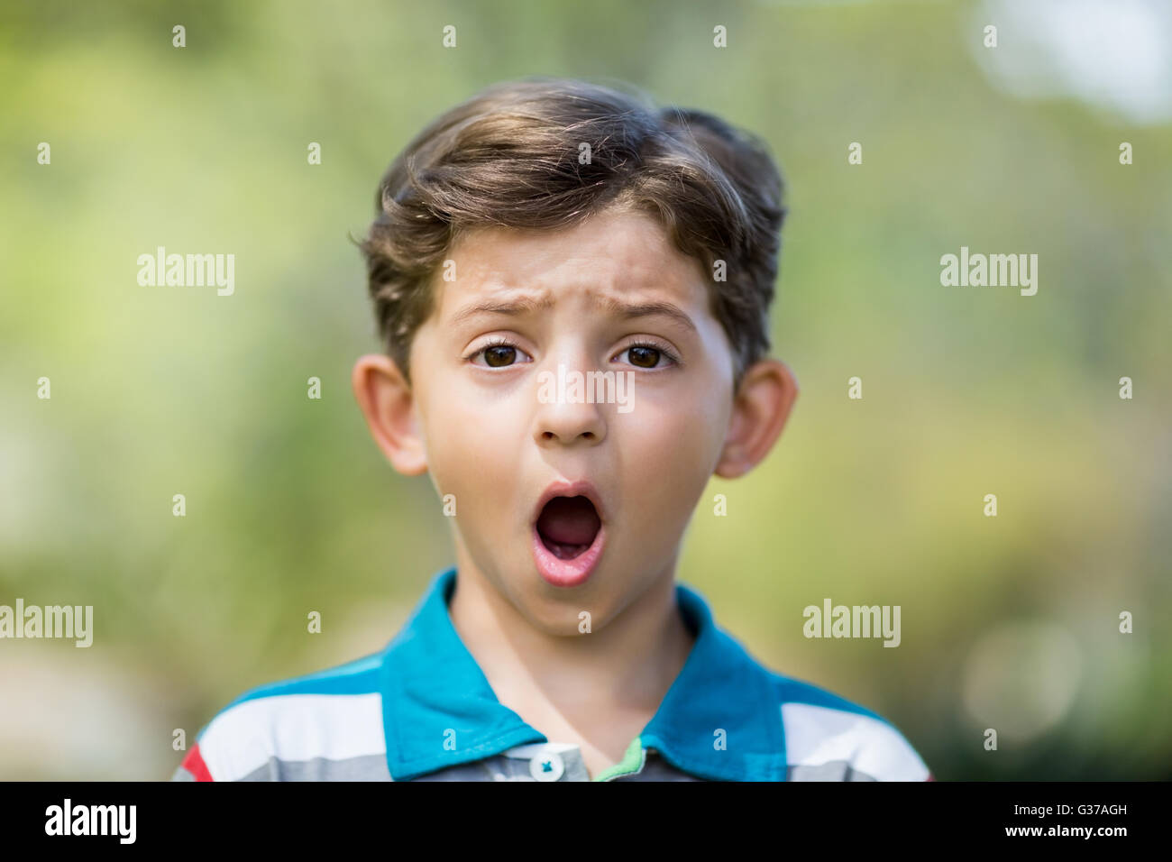 Young boy making a funny faces Stock Photo