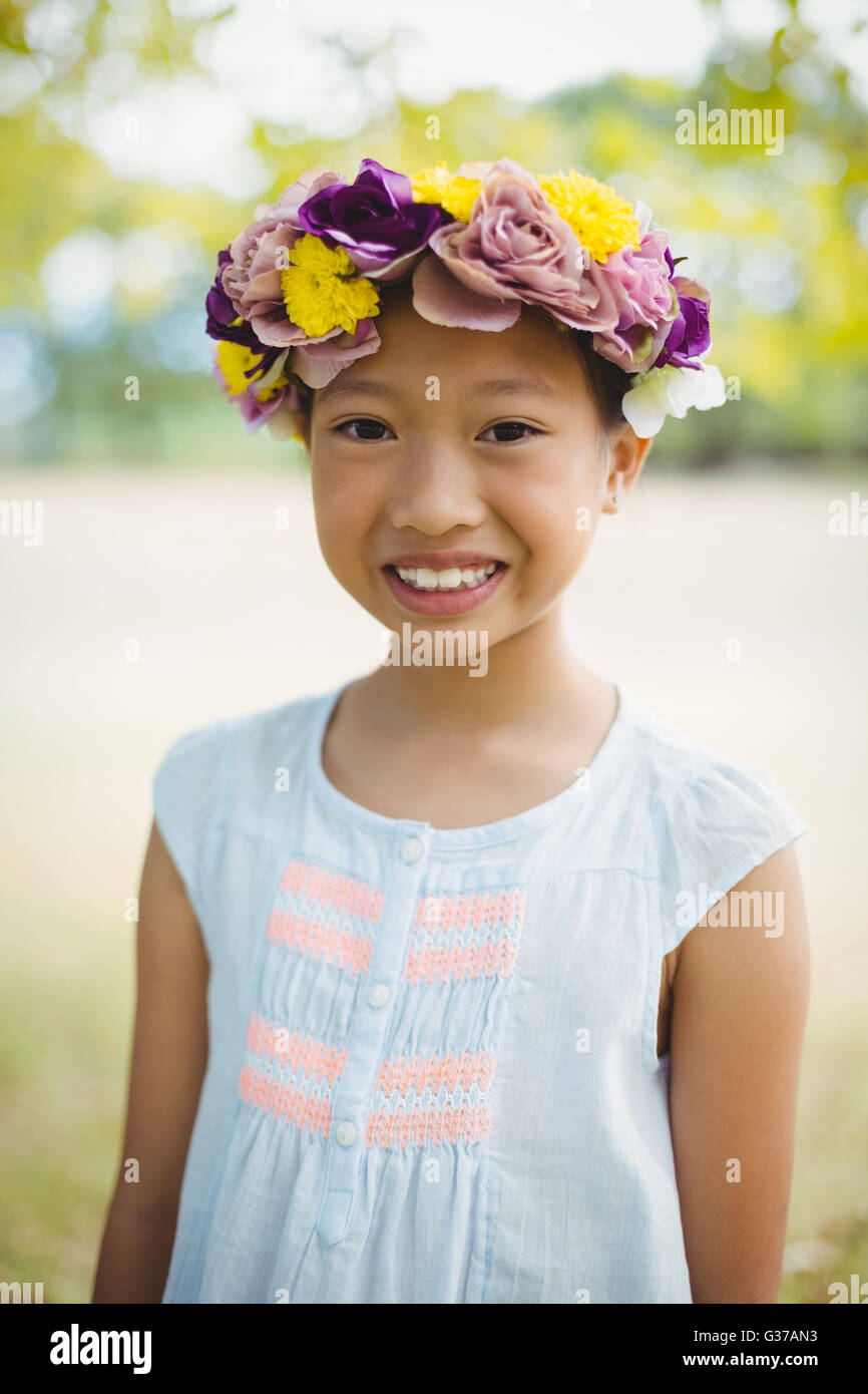 Portrait of girl smiling in park Stock Photo - Alamy
