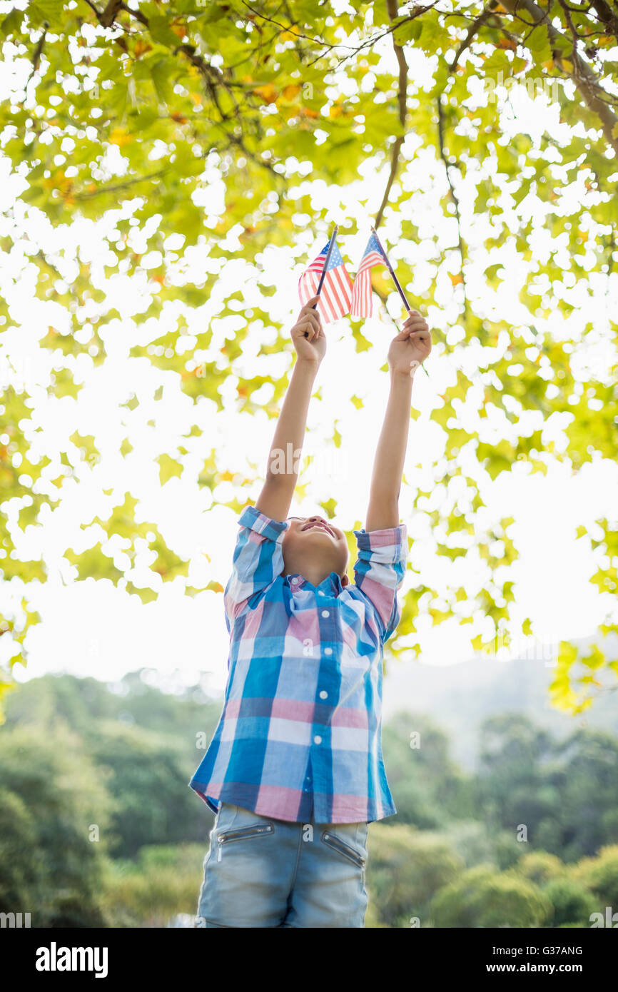 Girl holding an American flag Stock Photo - Alamy