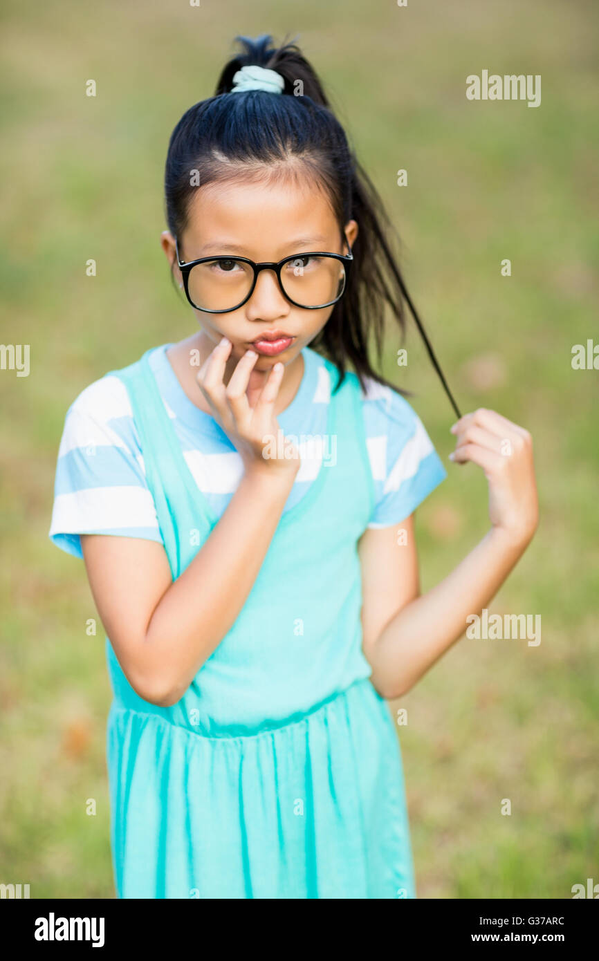 Asian girl hand on chin hi-res stock photography and images - Alamy