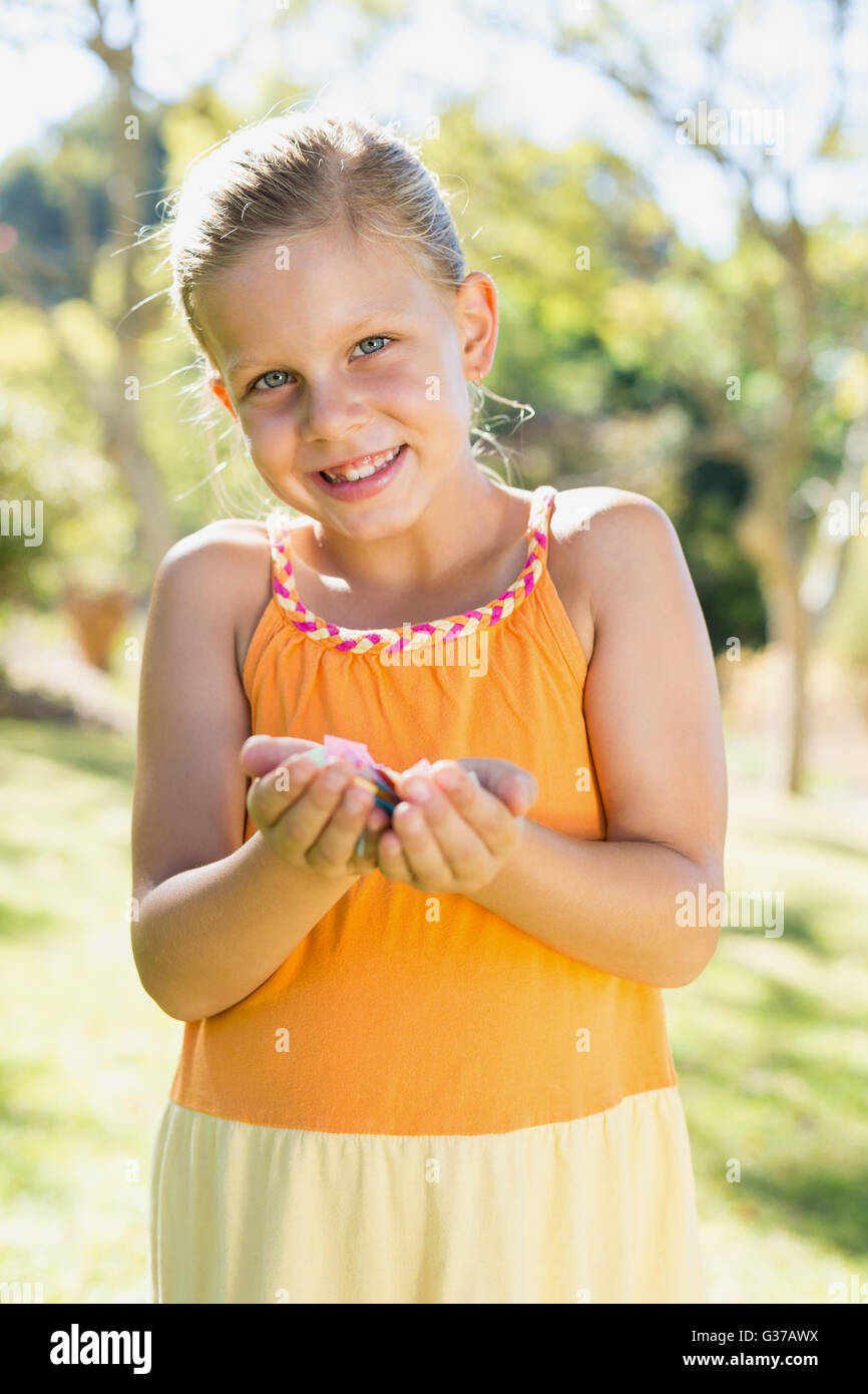 Happy girl holding hi-res stock photography and images - Alamy