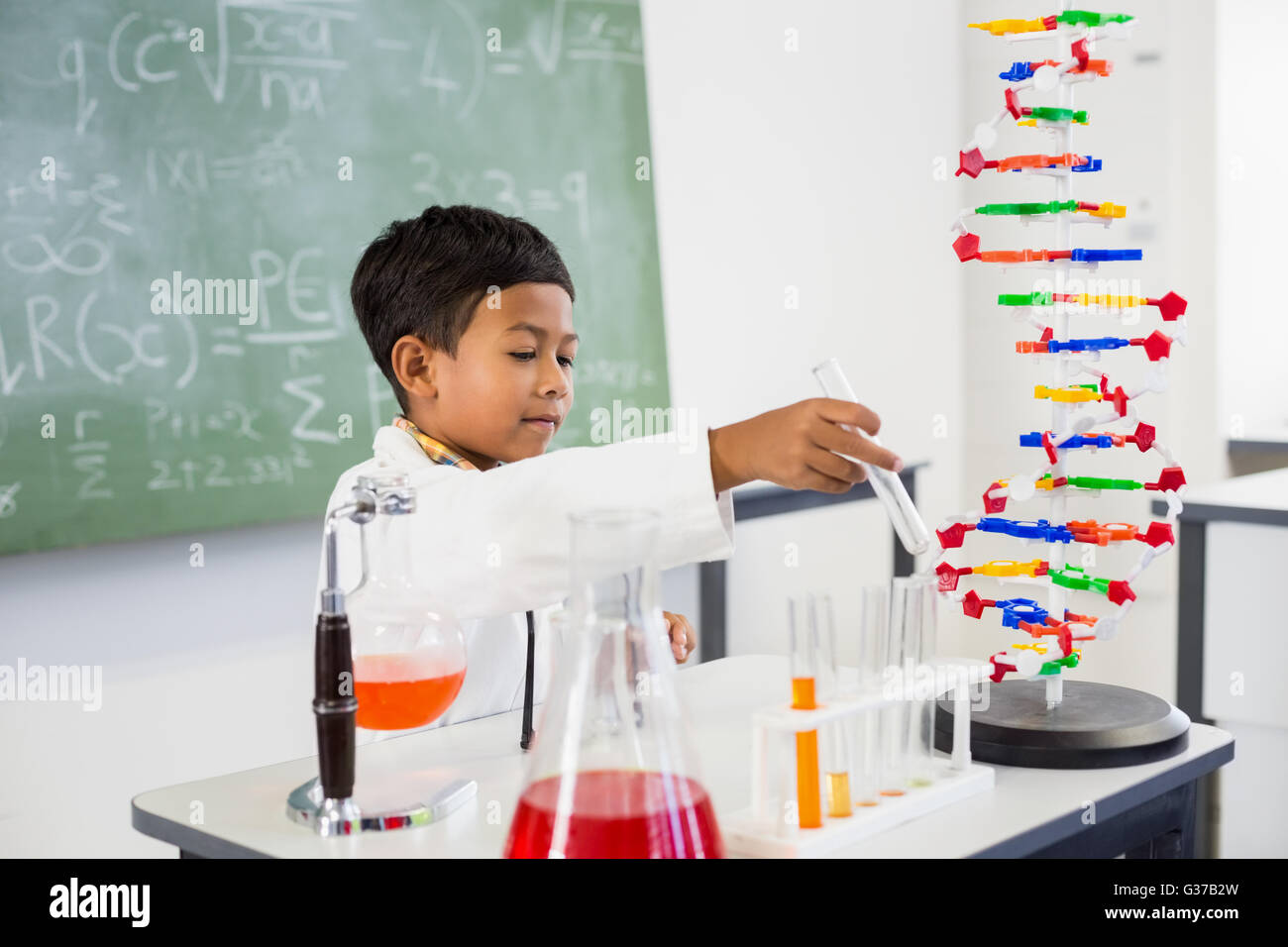 Schoolboy doing chemical experiment hi-res stock photography and images ...