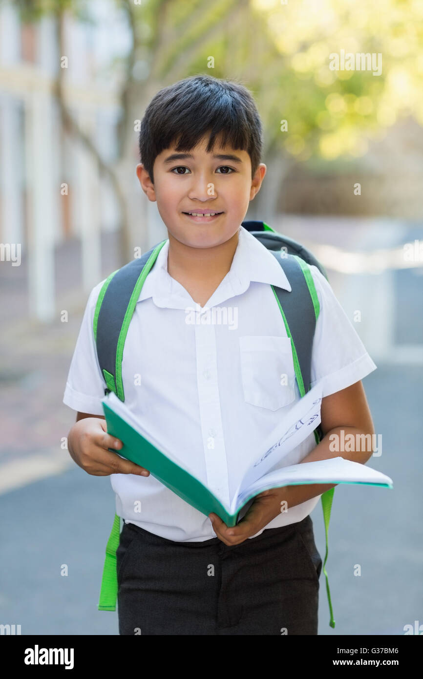 Schoolboy reading book hires stock photography and images Alamy