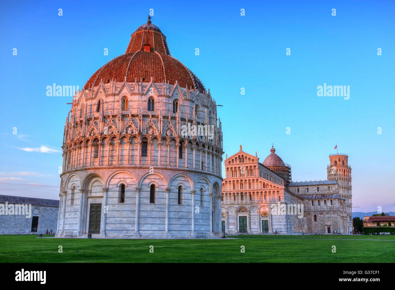 Piazza del Duomo o dei Miracoli or Cathedral Square of Miracles, Baptistery by sunset, Pisa, Italy, hdr Stock Photo