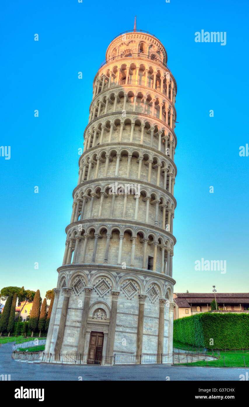 Pisa tower at Piazza del Duomo o dei Miracoli or Cathedral Square of Miracles by sunset, Italy, hdr Stock Photo