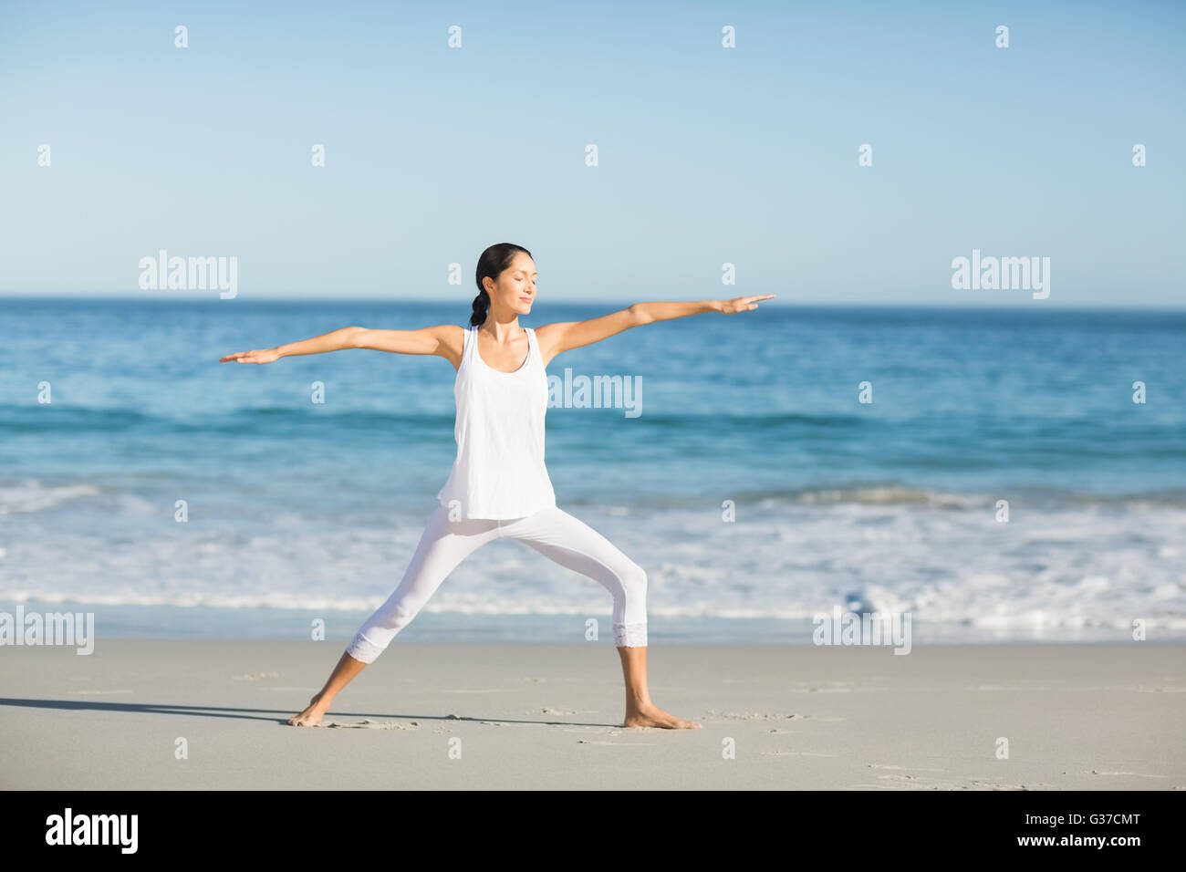 Young woman doing arms exercise hi-res stock photography and images - Alamy
