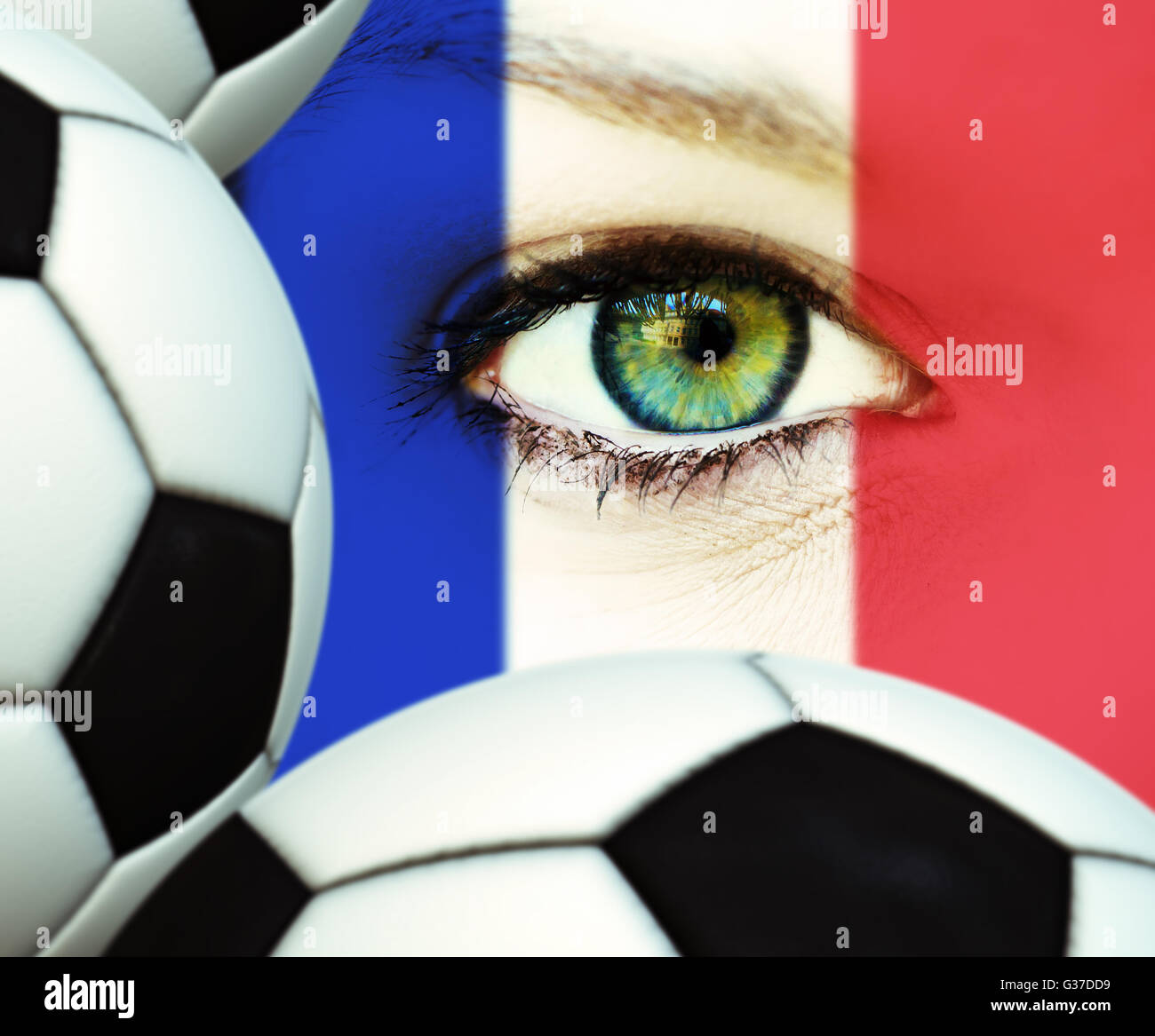 Face with french painting and soccerballs Stock Photo