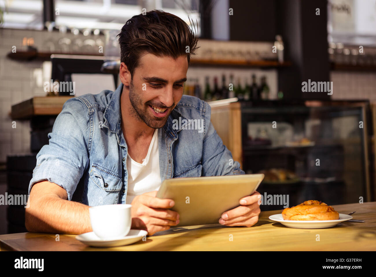 Smiling caucasian man using hi-res stock photography and images - Alamy