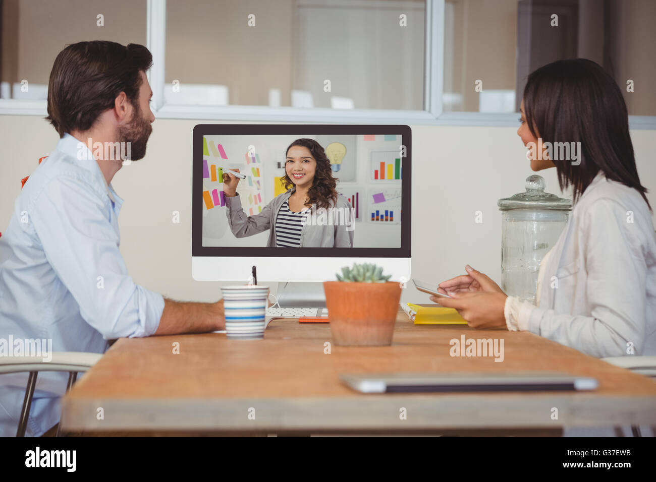 Two colleagues having a video conference Stock Photo