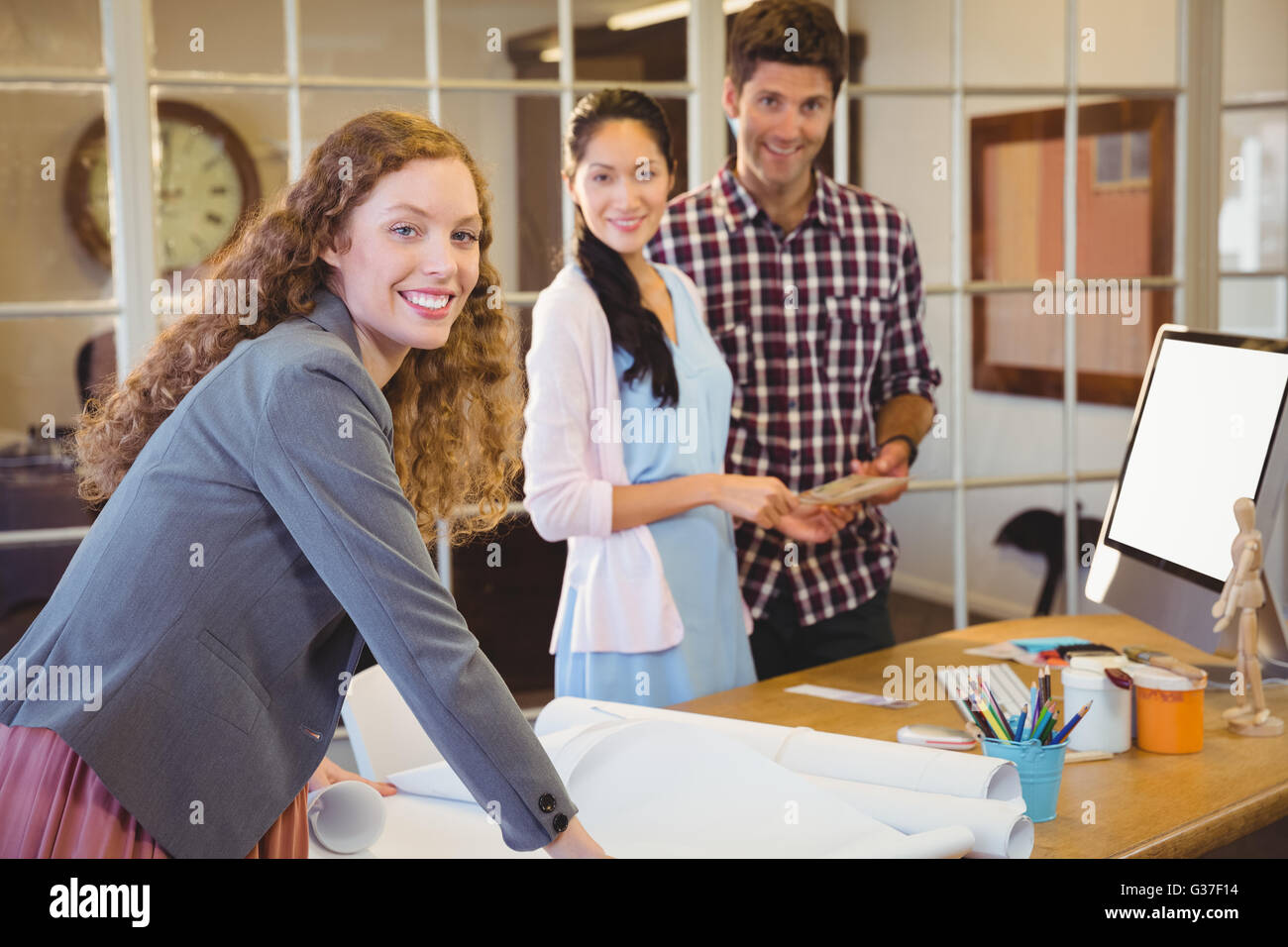 Business people posing together Stock Photo - Alamy