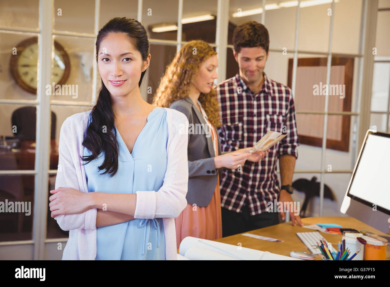 Business people posing together Stock Photo - Alamy