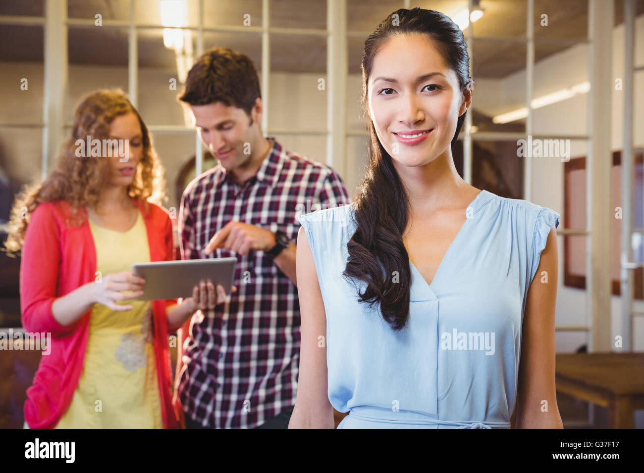 Business people posing together Stock Photo - Alamy