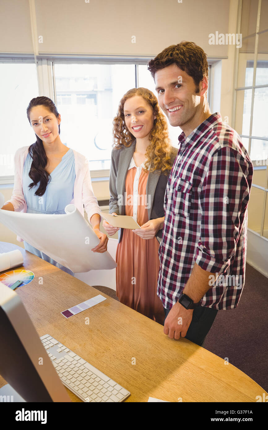 Business people posing together Stock Photo - Alamy