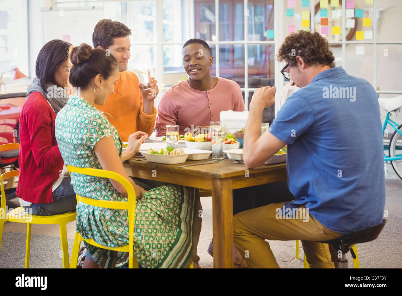 Business people eating together Stock Photo
