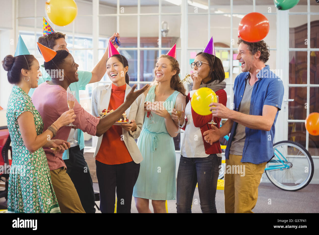 Business people celebrating a birthday Stock Photo