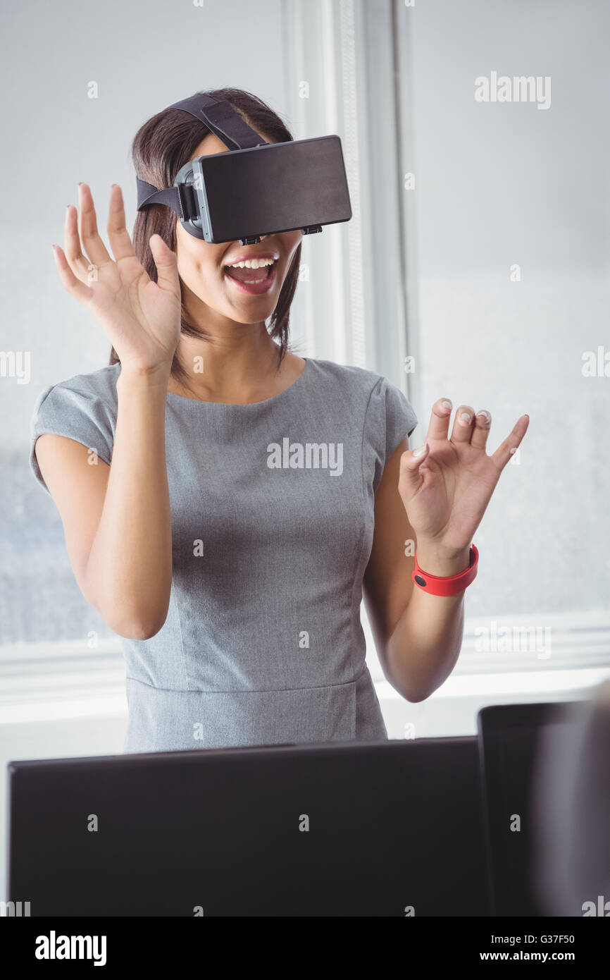 Business woman using 3D glasses Stock Photo