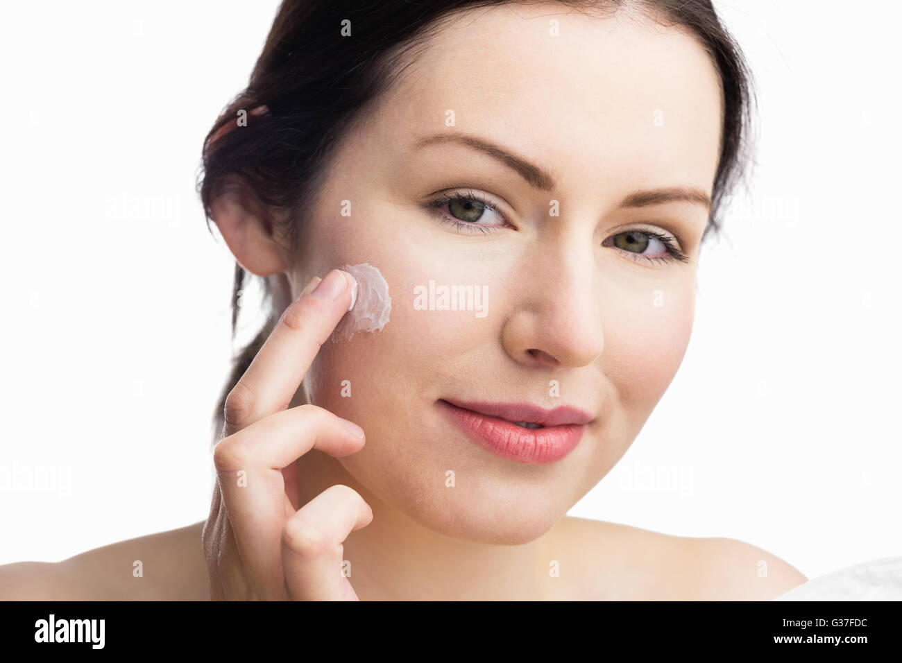 Woman applying a cream Stock Photo