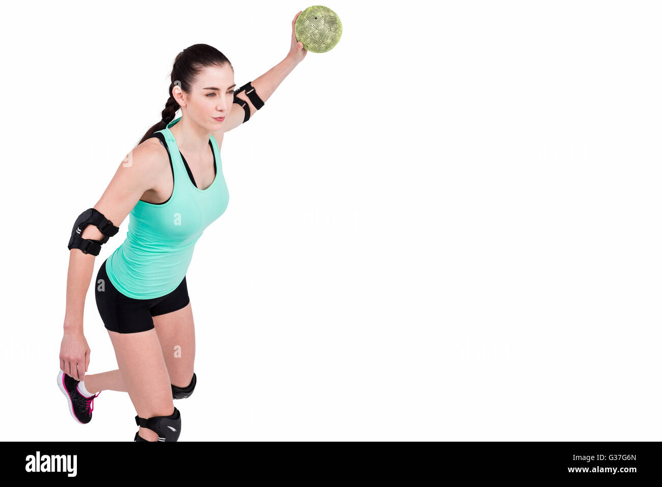 Female athlete with elbow pad throwing handball Stock Photo Alamy