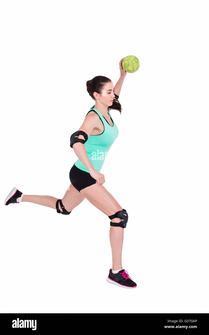 Female athlete with elbow pad throwing handball Stock Photo Alamy