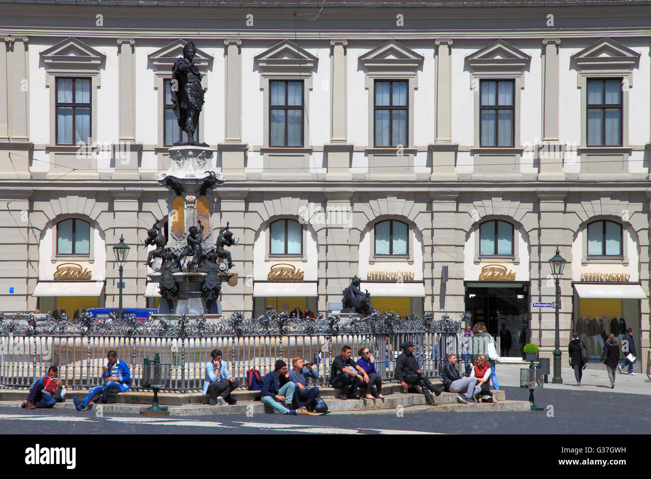 Germany, Bavaria, Augsburg, Rathausplatz, fountain, people, Stock Photo