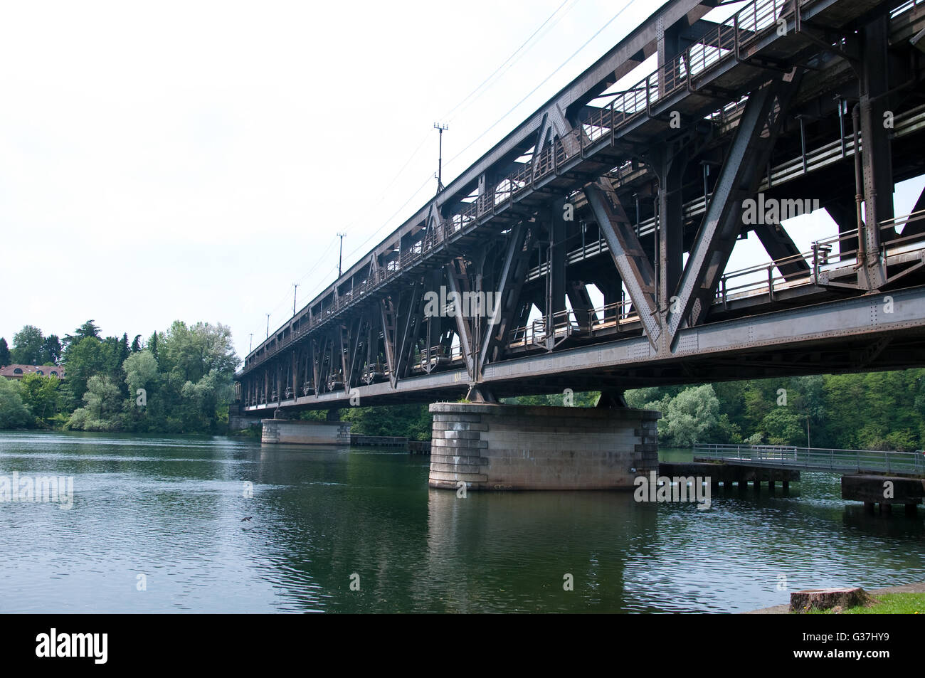 beautiful old wrought iron bridge on Ticino river Stock Photo