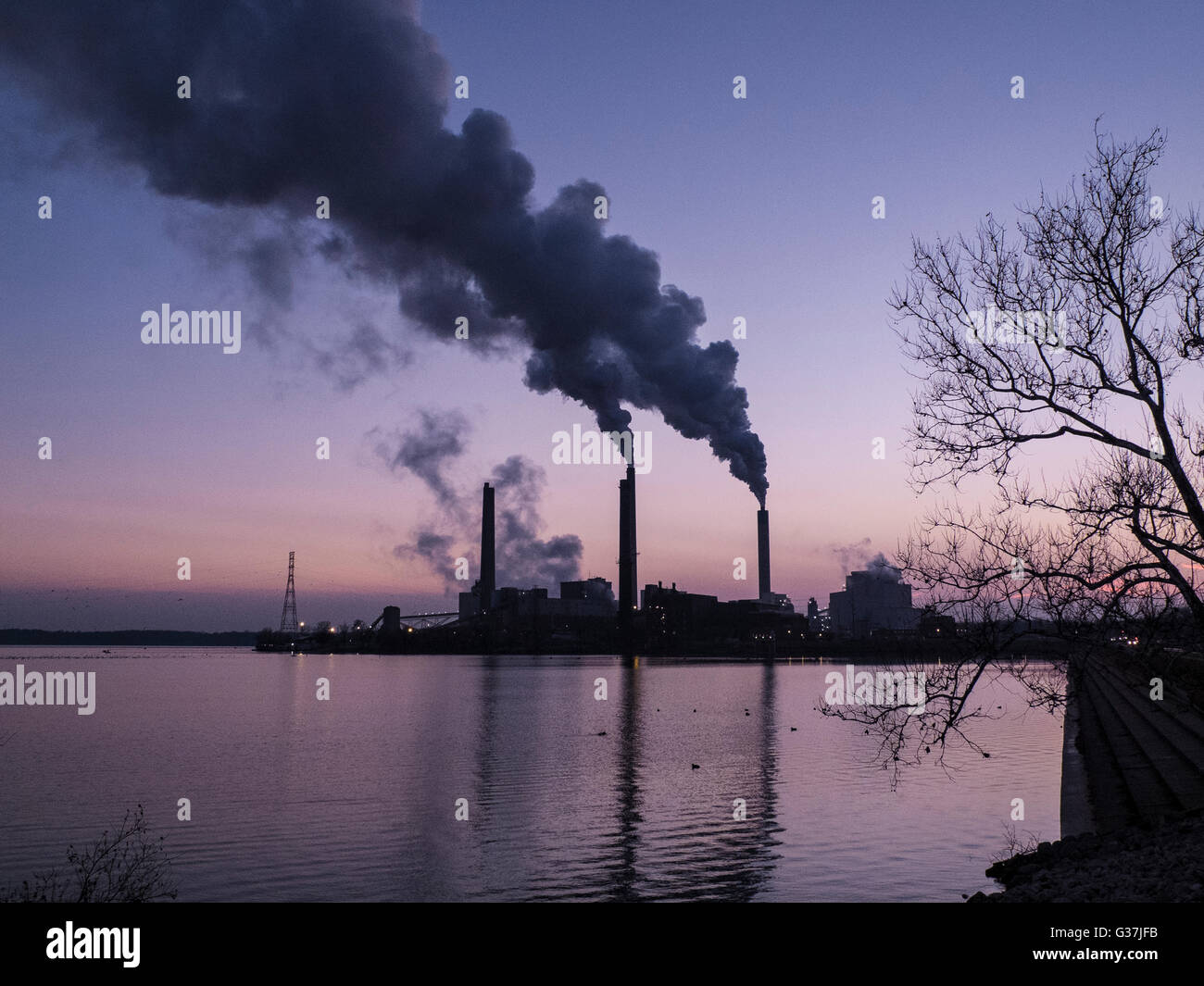 Fossil fuel power plant produces waste flue gases Stock Photo Alamy