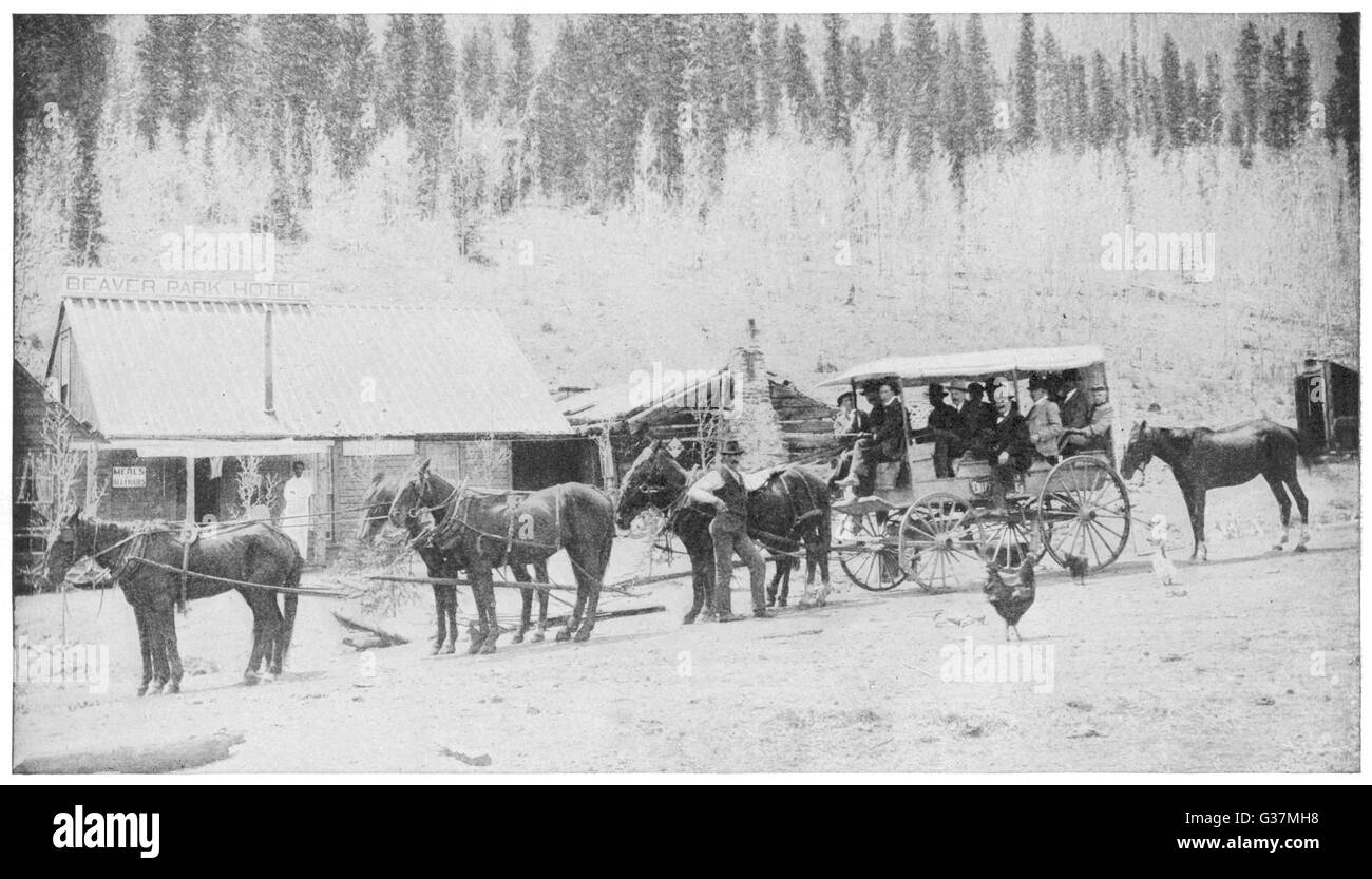 A stagecoach in a frontier  town, USA.         Date: 1905 Stock Photo