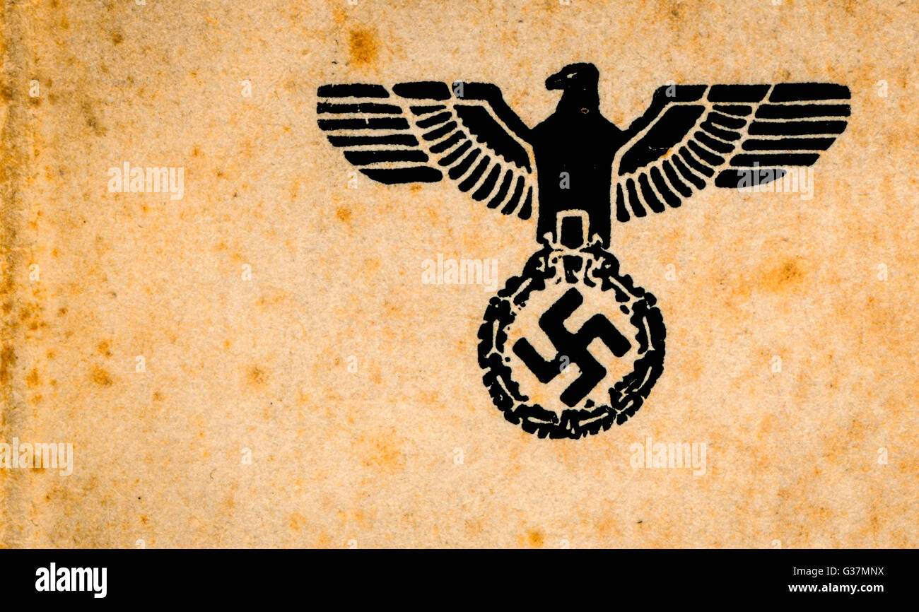the nazi emblem with the roman eagle and swastika printed in black on old paper Stock Photo