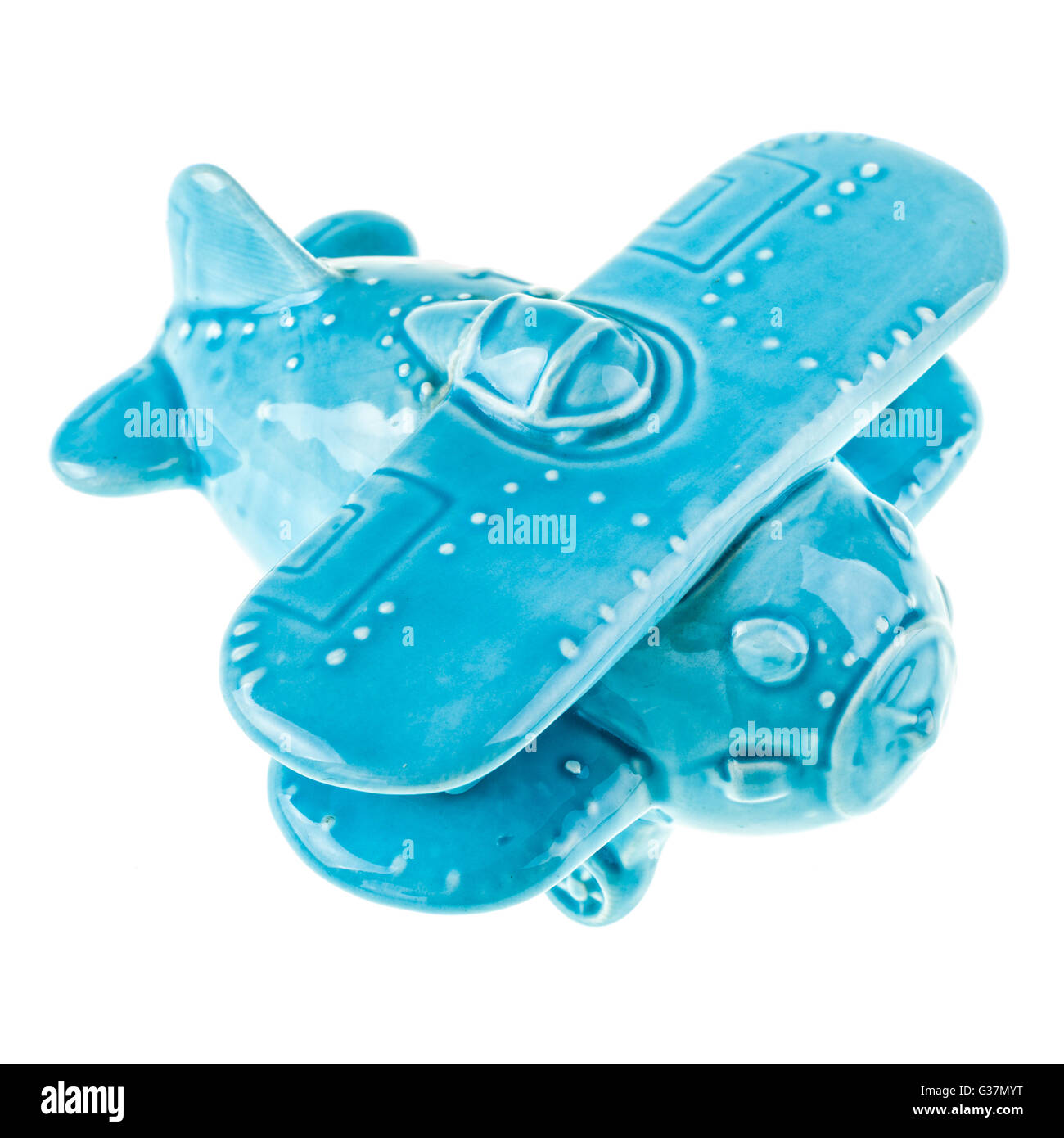 a blue porcelain cute airplane model isolated over a white background Stock Photo
