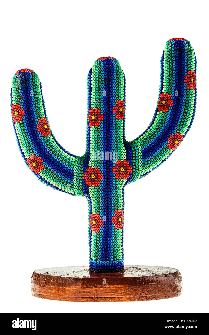 a beaded and colorful mexican cactus souvenir isolated over a white background Stock Photo