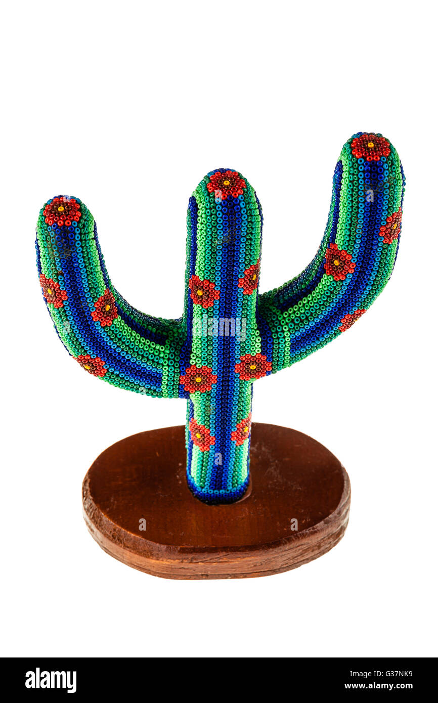 a beaded and colorful mexican cactus souvenir isolated over a white background Stock Photo