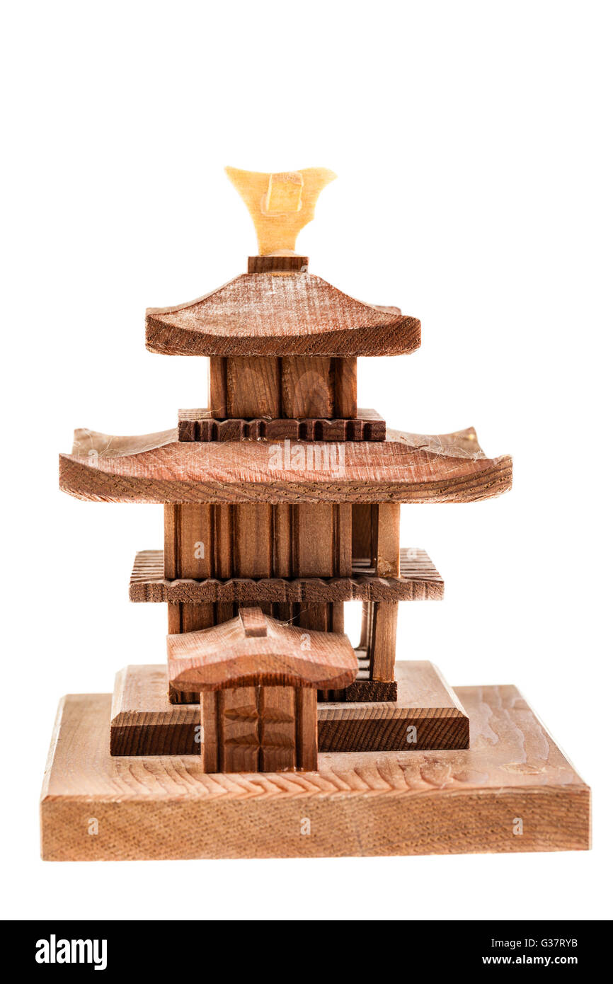 a small chinese wooden temple model isolated over a white background Stock Photo