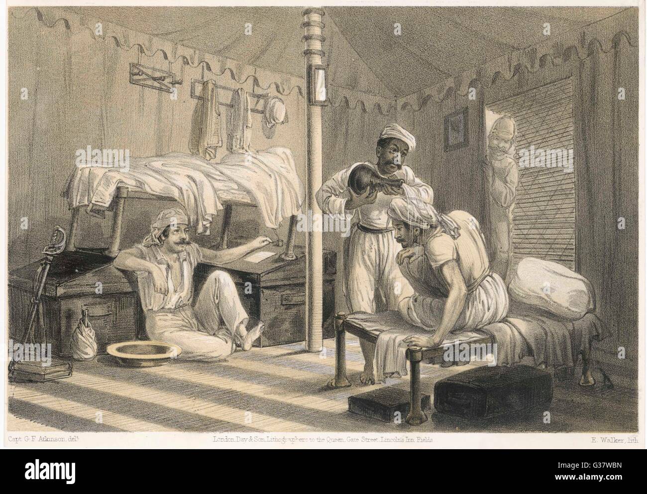 British officers relaxing in their tent during the hottest part of the day in India, 1860, from Curry and Rice (on Forty Plates) by Captain Geo. F. Atkinson.     Date: 1860 Stock Photo