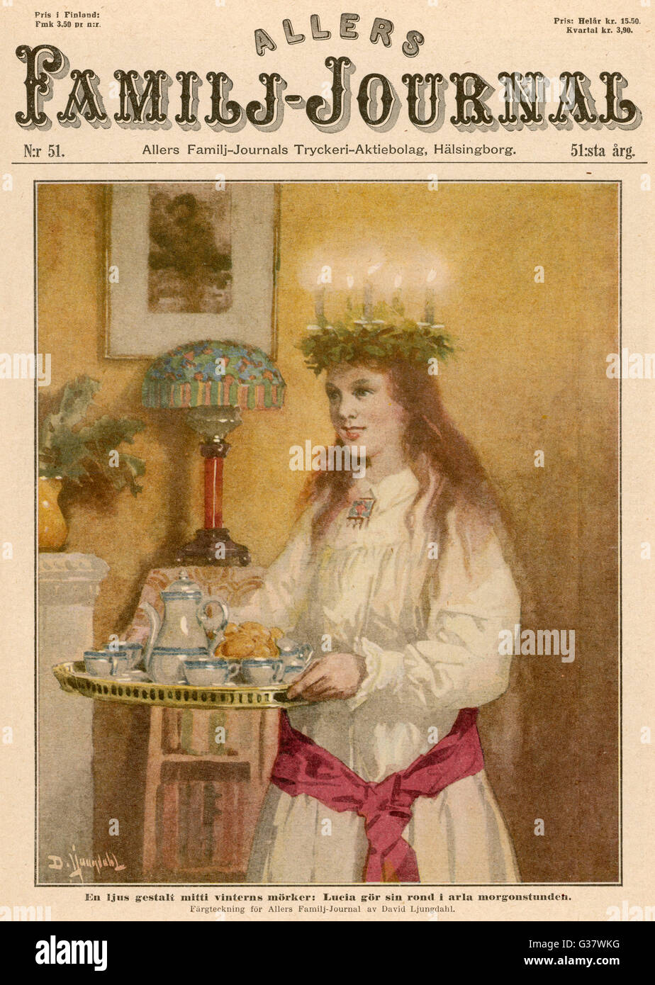 Saint Lucy's day (15 December) The girl chosen to be Lucia  carries coffee and cakes to  those preparing Christmas  gifts and decorations      Date: 1927 Stock Photo
