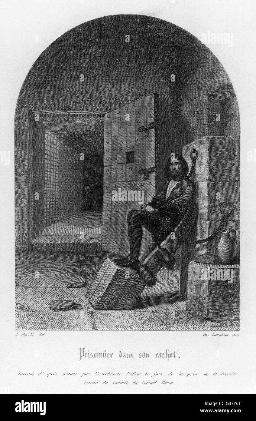 La Bastille, Paris: a prisoner chained in his 'cachot' (cell): this is how the captives were found by the takers of the prison.     Date: 14th July 1789 Stock Photo