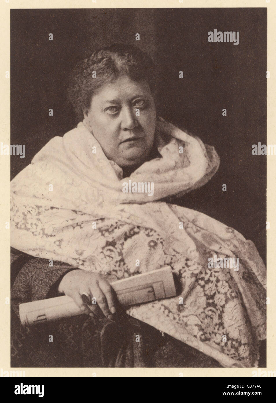 Helena Petrovna Blavatsky(1831-1891). Russian mystic and writer(wearing shawl, holding rolled magazine). Stock Photo