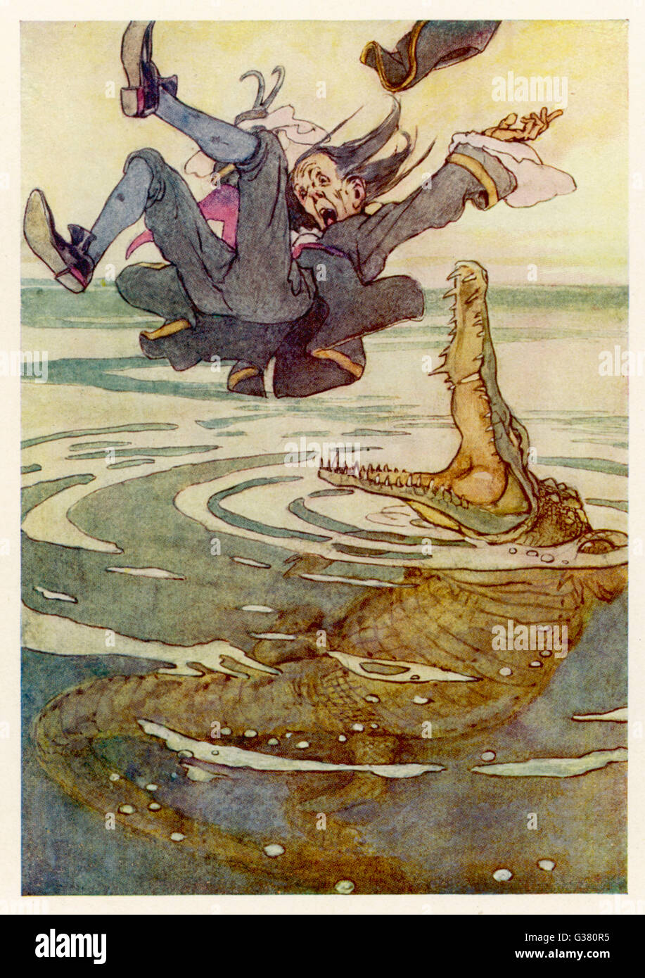 Captain Hook falls into the  jaws of the crocodile...         Date: First published: 1904 Stock Photo