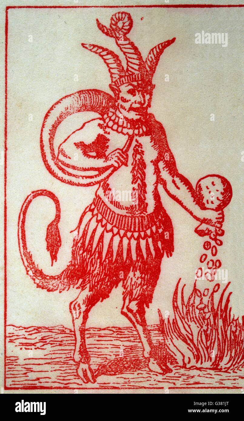 Red Devil with 3 horns, tail and goats legs pours money into the fire Stock Photo
