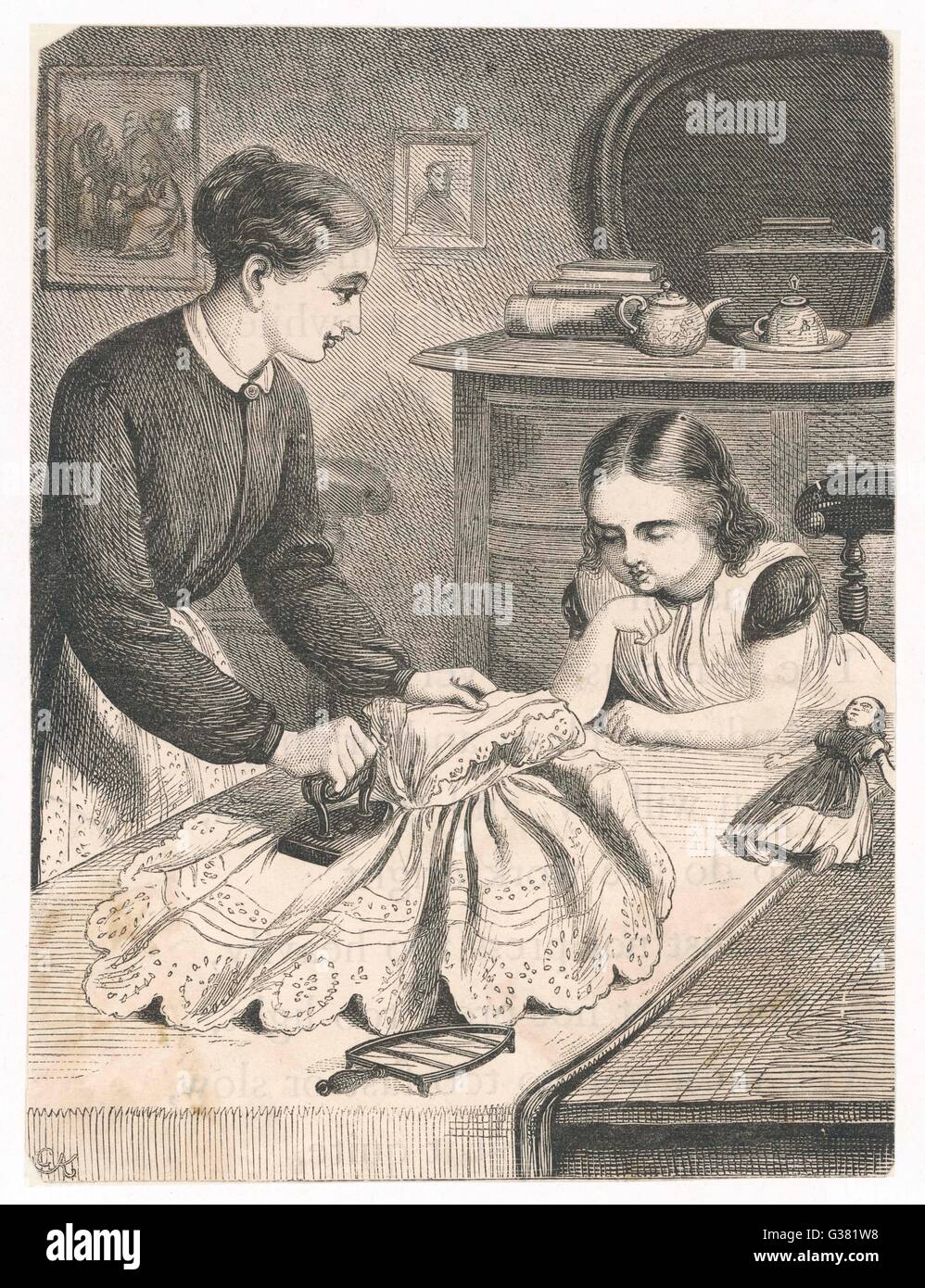 CHILD HELPS MAMA IRON Stock Photo Alamy