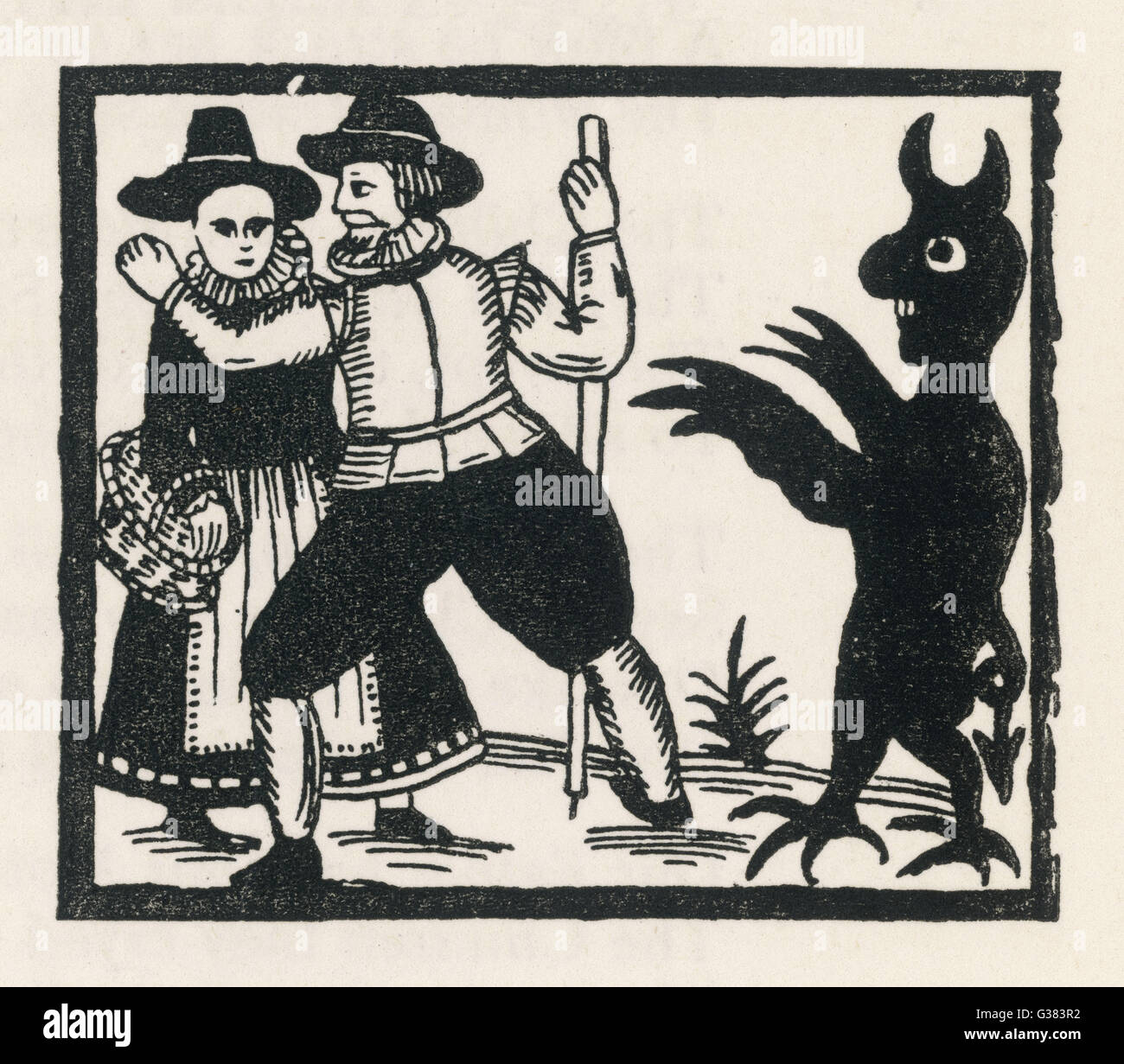 Demon and Couple Stock Photo