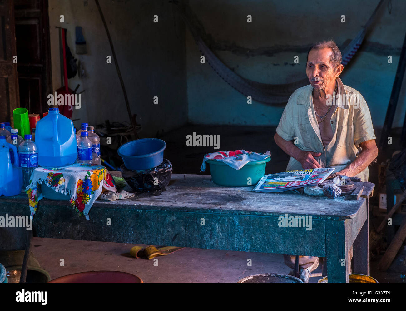 Salvadoran man work at a Corn tortilla factory in Suchitoto El Salvador