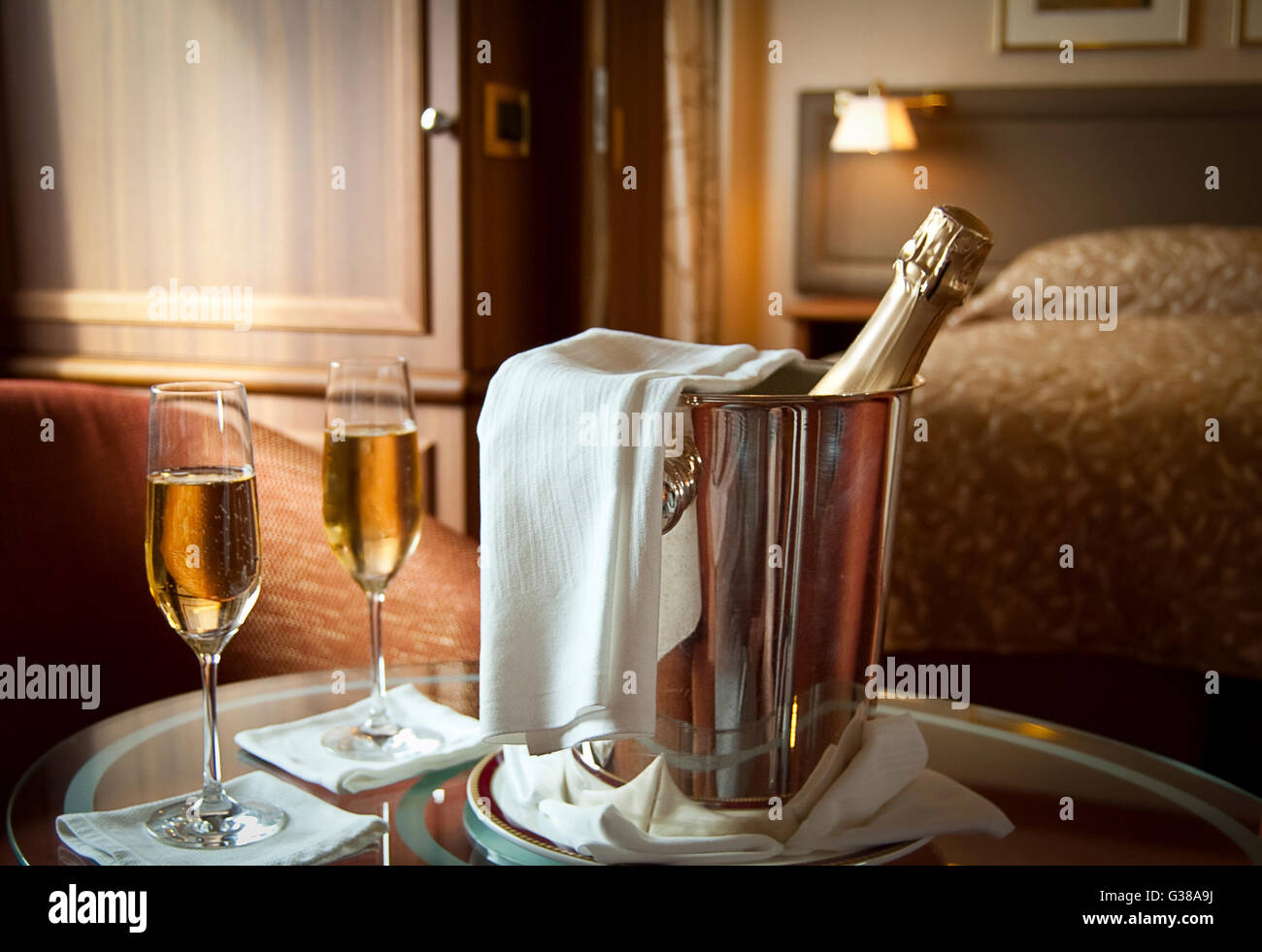 Chilled champagne in hotel room Stock Photo