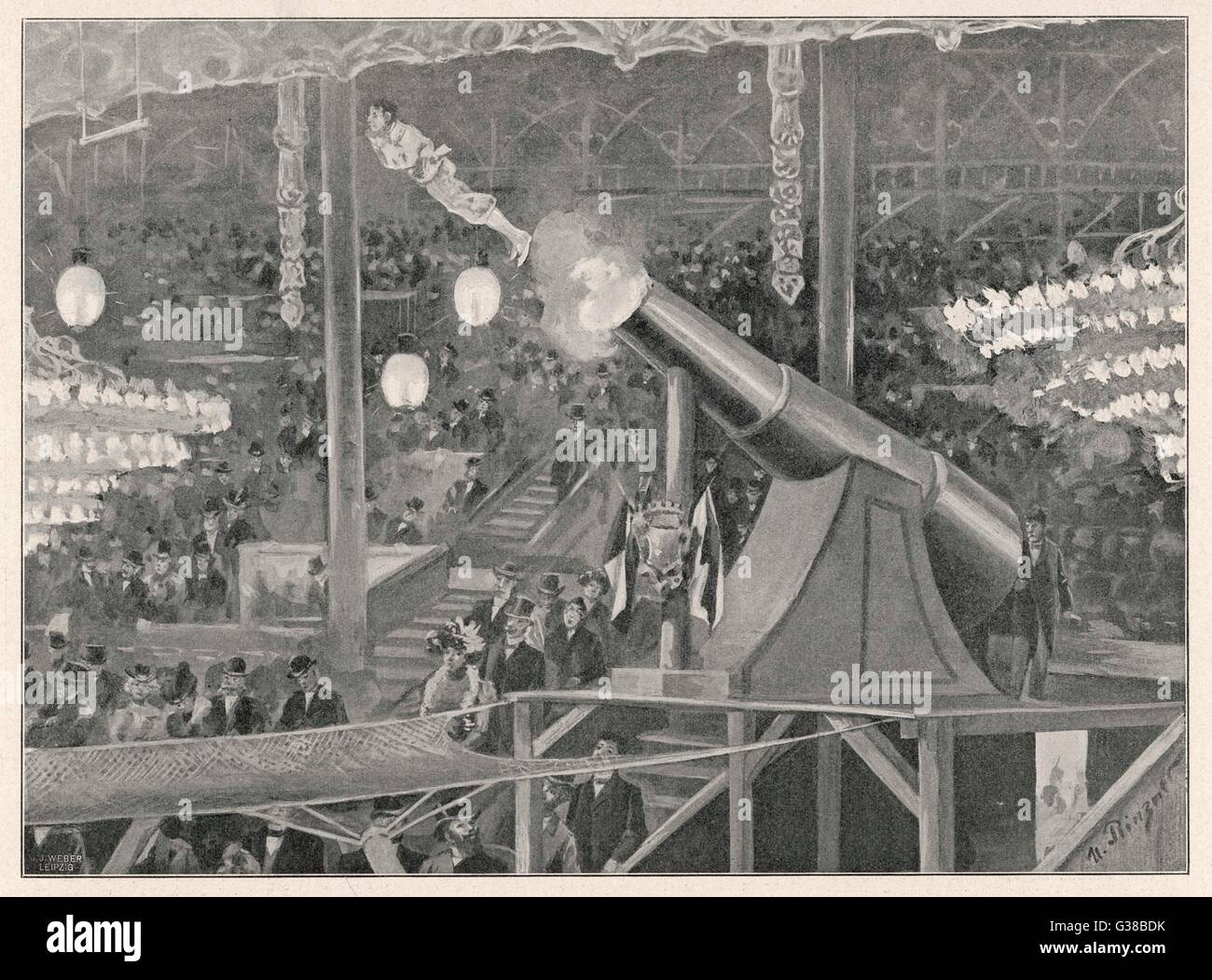 At the Circus Busch, a 'human  cannonball' is seemingly shot  from a gun       Date: 1905 Stock Photo