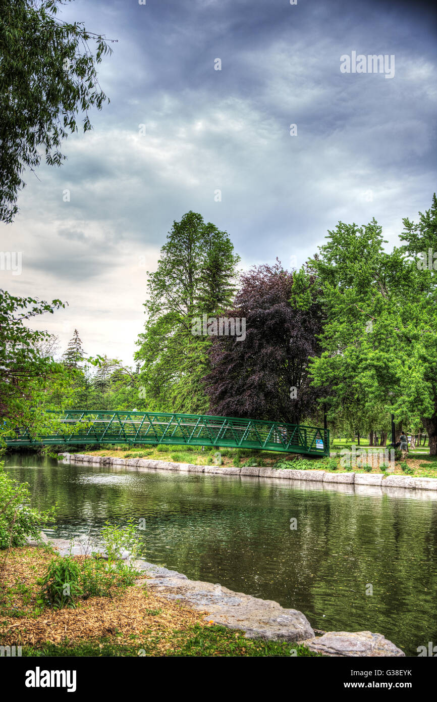 Green bridge in Victoria Park in Kitchener Waterloo Ontario Stock Photo
