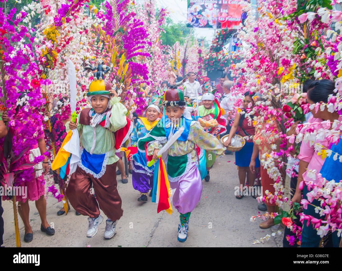 Salvadorian people participate in the procession of the Flower & Palm