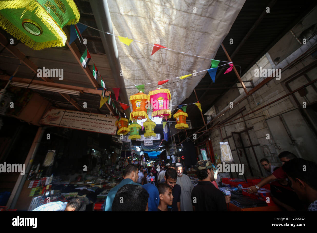 Palestinian vendors display different models of food, candy, meats