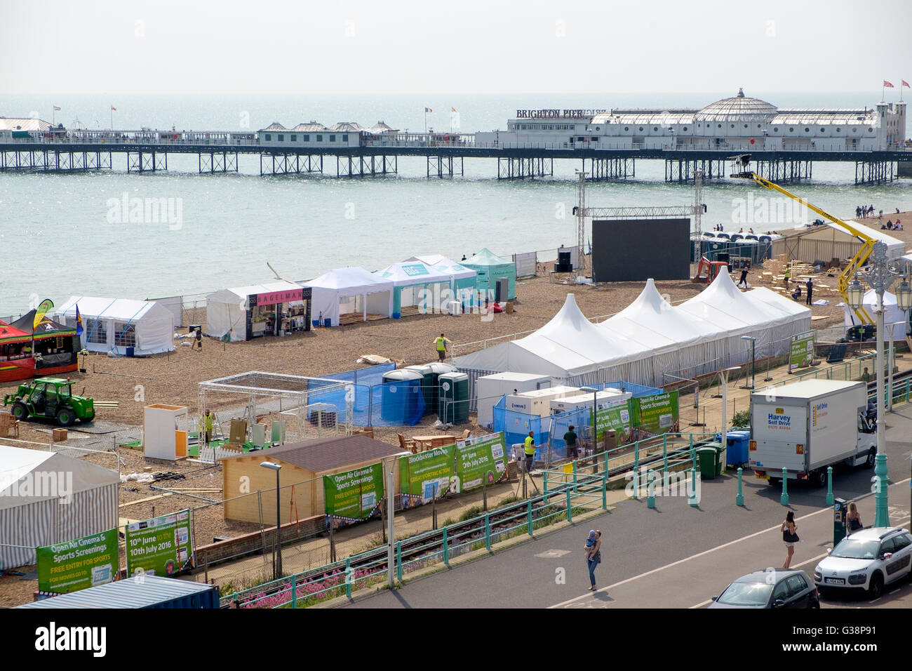 Brighton, UK. 8th June, 2016. With one day to go to the opening of the UEFA European Championships final preparations are being made to what will be a giant screen fan park on Brighton Beach.  This, Brighton's Big Screen, will also serve as the UK's largest open air beach front cinema on days when no football is scheduled.  Credit:  Scott Hortop/Alamy Live News Stock Photo