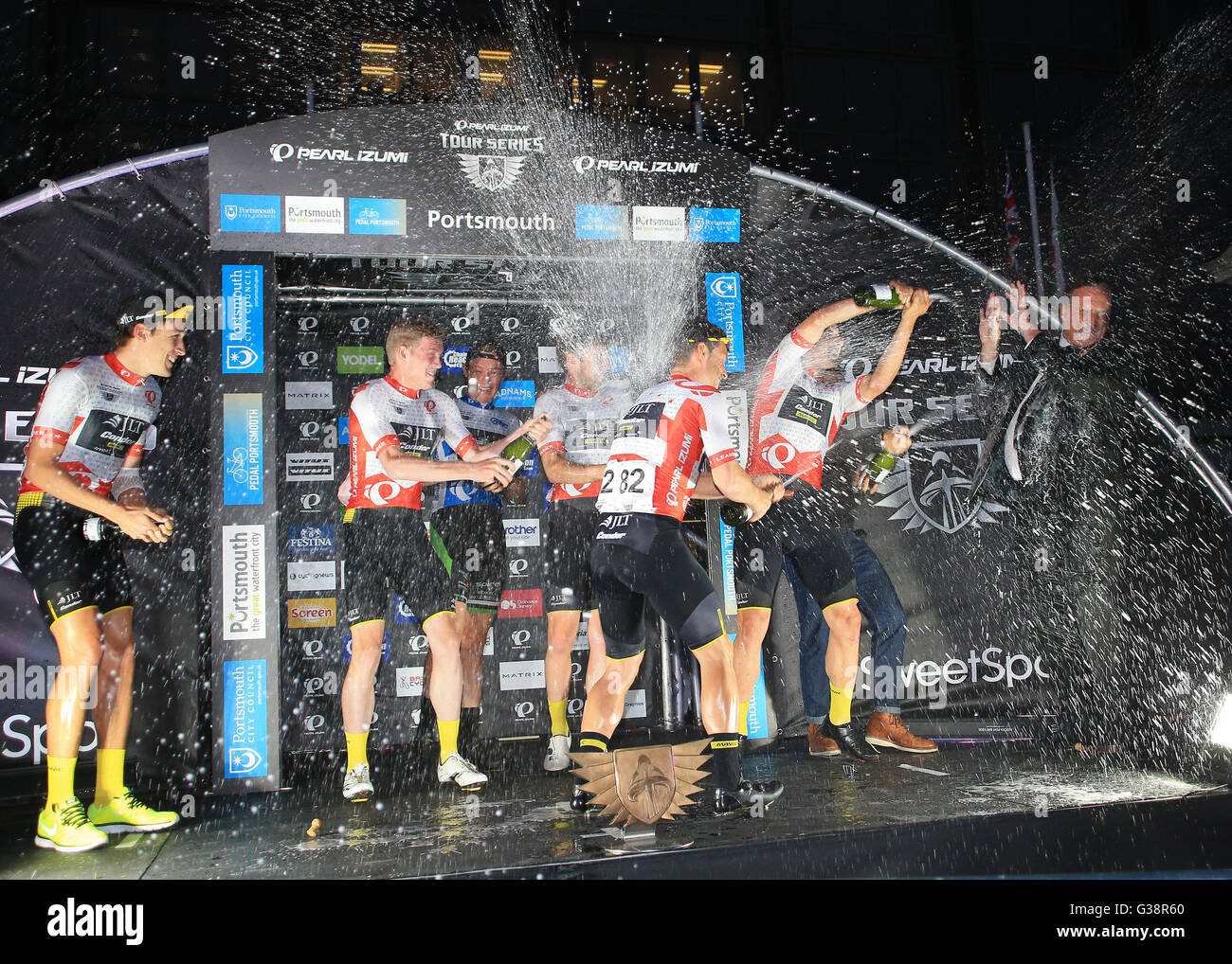 Portsmouth, UK. 09th June, 2016. Pearl Izumi Tour Series Cycling. Portsmouth. Portsmouth's Lord Mayer Councillor David Fuller gets covered with champagne during The Mens overall Tour Winners celebrations, by Team JLT Condor's Graham Briggs, Alex Frame, Chris Lawless, Jon Mould and Alistair Slater Credit:  Action Plus Sports/Alamy Live News Stock Photo